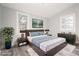 Comfortable bedroom with a large window, stylish furnishings, and a calming color palette at 358 Roy Sw St, Atlanta, GA 30310