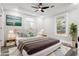 Bright bedroom with modern decor, ceiling fan, and ample natural light at 358 Roy Sw St, Atlanta, GA 30310