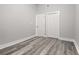 Empty bedroom features wood-look floors and a closet at 358 Roy Sw St, Atlanta, GA 30310