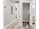 Hallway with doors and wood-look floors at 358 Roy Sw St, Atlanta, GA 30310