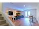 Finished basement boasts a brick fireplace, large screen TV, bar and walkout access at 3811 Valley Green Dr, Marietta, GA 30068