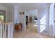 Bright foyer with hardwood floors, offering a view into the home office/ den and staircase at 3811 Valley Green Dr, Marietta, GA 30068