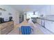 Bright eat-in kitchen features wooden table, white cabinets, and stainless-steel appliances at 3811 Valley Green Dr, Marietta, GA 30068