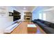 Modern living room boasting a brick fireplace and entertainment center with hardwood flooring at 3811 Valley Green Dr, Marietta, GA 30068