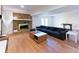 Spacious basement living room with a cozy fireplace and ample seating at 3811 Valley Green Dr, Marietta, GA 30068