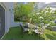 Charming patio area featuring outdoor seating amidst lush landscaping, creating a serene retreat at 3811 Valley Green Dr, Marietta, GA 30068