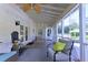 Relaxing screened-in porch with comfortable seating and an overhead ceiling fan at 3811 Valley Green Dr, Marietta, GA 30068
