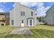 Well-maintained backyard with lush green lawn and concrete patio at 2274 Stancrest Ln, Lawrenceville, GA 30044