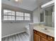 A bright bathroom featuring a vanity and shower with tub at 2274 Stancrest Ln, Lawrenceville, GA 30044