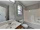 Full bathroom featuring a vanity, toilet, and tub with shower at 2274 Stancrest Ln, Lawrenceville, GA 30044