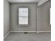 A spacious bedroom with a large window for natural light at 2274 Stancrest Ln, Lawrenceville, GA 30044