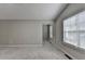 A large bedroom featuring natural light from the window at 2274 Stancrest Ln, Lawrenceville, GA 30044
