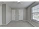 Bedroom with carpet and natural light streaming through a window at 2274 Stancrest Ln, Lawrenceville, GA 30044