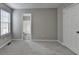 Neutral bedroom with grey walls and an attached bathroom at 2274 Stancrest Ln, Lawrenceville, GA 30044
