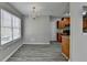 Dining area with chandelier, natural light, and views into the adjacent kitchen at 2274 Stancrest Ln, Lawrenceville, GA 30044