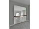 The view from the hallway showing a chandelier above the front entry at 2274 Stancrest Ln, Lawrenceville, GA 30044