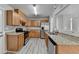 Updated kitchen with stainless steel appliances and granite countertops at 2274 Stancrest Ln, Lawrenceville, GA 30044