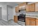 Updated kitchen features stainless steel appliances, granite countertops, and wood cabinets at 2274 Stancrest Ln, Lawrenceville, GA 30044