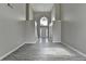Spacious living room with soaring ceiling, bright windows, and wood-look floors at 2274 Stancrest Ln, Lawrenceville, GA 30044