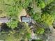 Aerial view of home with a deck, surrounded by mature trees in a private setting at 292 Old Rosser Rd, Stone Mountain, GA 30087