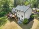 Aerial view of the home featuring a spacious deck and landscaped backyard at 292 Old Rosser Rd, Stone Mountain, GA 30087