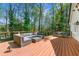 Outdoor deck featuring comfortable seating with a table and natural views at 292 Old Rosser Rd, Stone Mountain, GA 30087