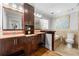 Bright bathroom featuring double vanities, a soaking tub, and elegant tile work at 292 Old Rosser Rd, Stone Mountain, GA 30087