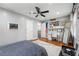 Light-filled bedroom featuring a ceiling fan and vintage record player at 292 Old Rosser Rd, Stone Mountain, GA 30087