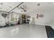 Well-organized garage with storage racks, epoxy flooring, and ample space for vehicles at 292 Old Rosser Rd, Stone Mountain, GA 30087