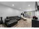 Bright living room with recessed lighting, modern furniture, and stylish decor at 292 Old Rosser Rd, Stone Mountain, GA 30087