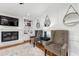 Cozy living room featuring a fireplace, built-in shelves, and comfortable seating at 292 Old Rosser Rd, Stone Mountain, GA 30087