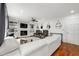 Spacious living room featuring a fireplace, built-in shelving and comfortable white sofa at 292 Old Rosser Rd, Stone Mountain, GA 30087