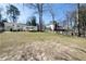 Expansive backyard with mature trees provides a private and serene outdoor space, offering ample room to roam at 139 W Paces Ferry Nw Rd, Atlanta, GA 30305