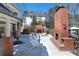 Spacious backyard features a brick fireplace and outdoor seating, perfect for entertaining guests at 139 W Paces Ferry Nw Rd, Atlanta, GA 30305