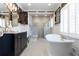 Elegant bathroom featuring a freestanding tub, dual sink vanity, and stylish fixtures providing a luxurious bathing experience at 139 W Paces Ferry Nw Rd, Atlanta, GA 30305