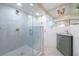 Well-lit bathroom with marble shower, white subway tile, and a vessel sink vanity at 139 W Paces Ferry Nw Rd, Atlanta, GA 30305