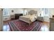 Cozy bedroom with hardwood floors, a comfortable bed, and shuttered windows creating a serene and inviting atmosphere at 139 W Paces Ferry Nw Rd, Atlanta, GA 30305
