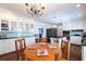 Eat-in kitchen with custom cabinetry, modern appliances, and a cozy breakfast nook with natural light at 139 W Paces Ferry Nw Rd, Atlanta, GA 30305