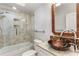 Bathroom featuring granite countertop, vessel sink, and glass-enclosed shower at 5780 Heards Forest Dr, Atlanta, GA 30328