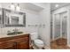 Beautiful bathroom with unique bowl sink, granite countertop and hexagon tile flooring at 5780 Heards Forest Dr, Atlanta, GA 30328
