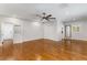 Spacious bedroom with hardwood floors, a ceiling fan and plenty of natural light at 5780 Heards Forest Dr, Atlanta, GA 30328