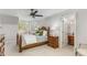 Cozy bedroom featuring wood furniture and an ensuite bathroom at 5780 Heards Forest Dr, Atlanta, GA 30328