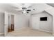 Bedroom features a unique ceiling fan, a tv and direct access to another room at 5780 Heards Forest Dr, Atlanta, GA 30328