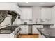 Gourmet kitchen features granite countertops, stainless steel appliances, and custom cabinetry at 5780 Heards Forest Dr, Atlanta, GA 30328