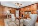 Beautiful office with custom wood paneling, hardwood floors, and an area rug at 5780 Heards Forest Dr, Atlanta, GA 30328