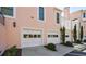 Attached garages offer convenient parking in this townhome community at 6 Lullwater Ne Est, Atlanta, GA 30307