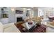 Cozy living room with a fireplace, built-in shelving, and stylish decor, perfect for relaxation at 6 Lullwater Ne Est, Atlanta, GA 30307