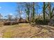The home has a large backyard and brick lined flower beds at 135 Adair Se Ave, Atlanta, GA 30315