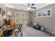 Bedroom featuring a large window with blinds and a ceiling fan at 357 Murray Hill Ne Ave, Atlanta, GA 30317