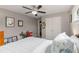 Bedroom featuring a ceiling fan and double door closet, with bright light at 357 Murray Hill Ne Ave, Atlanta, GA 30317